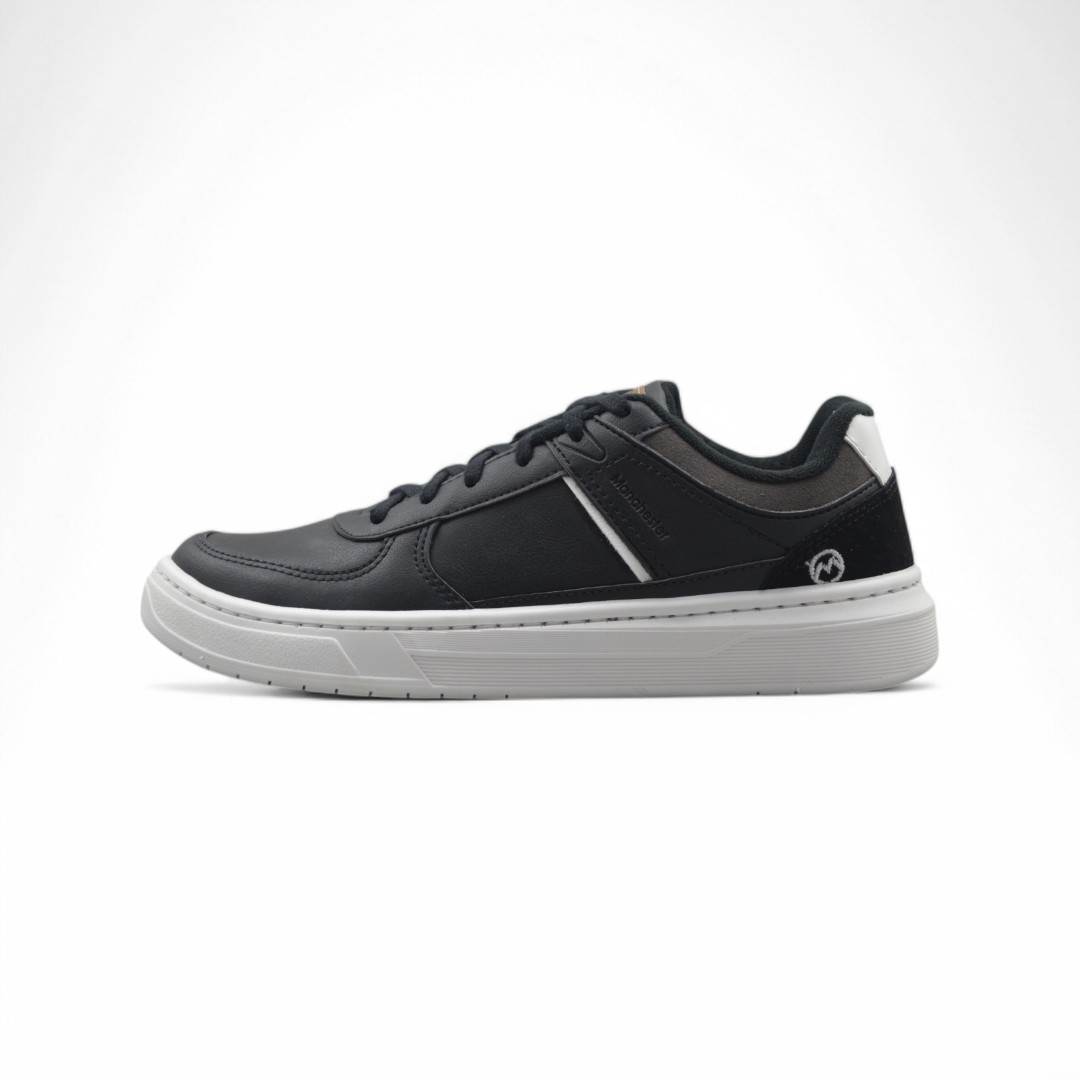 Articulo 2472<br>ZAPATILLA URBANA – MANCHESTER – 40/44 <br>Color 001 NEGRO <br> <span class='titulo_secundario' style='background-color:white;color:black;margin-top:7px; margin-bottom:0px;font-size:20px;'>Precio del Par</span>